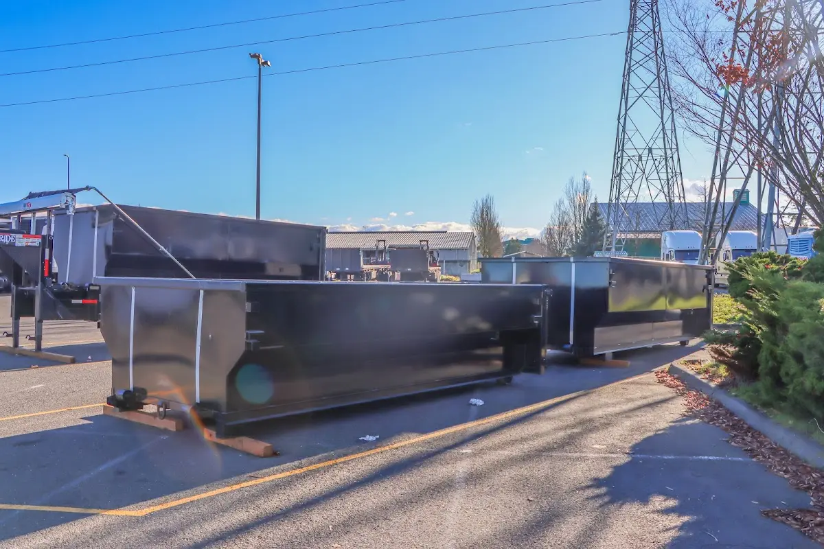 Roll-off dumpster ready for waste disposal at job site for 2 Yard Dumpster Rental in Red Oak